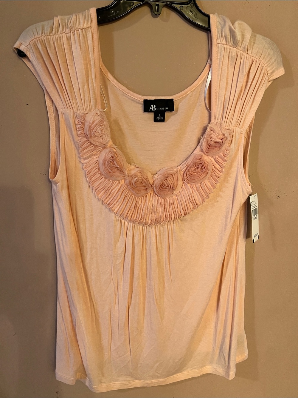 Romantic top by AB Studio. Never worn, tags attached.